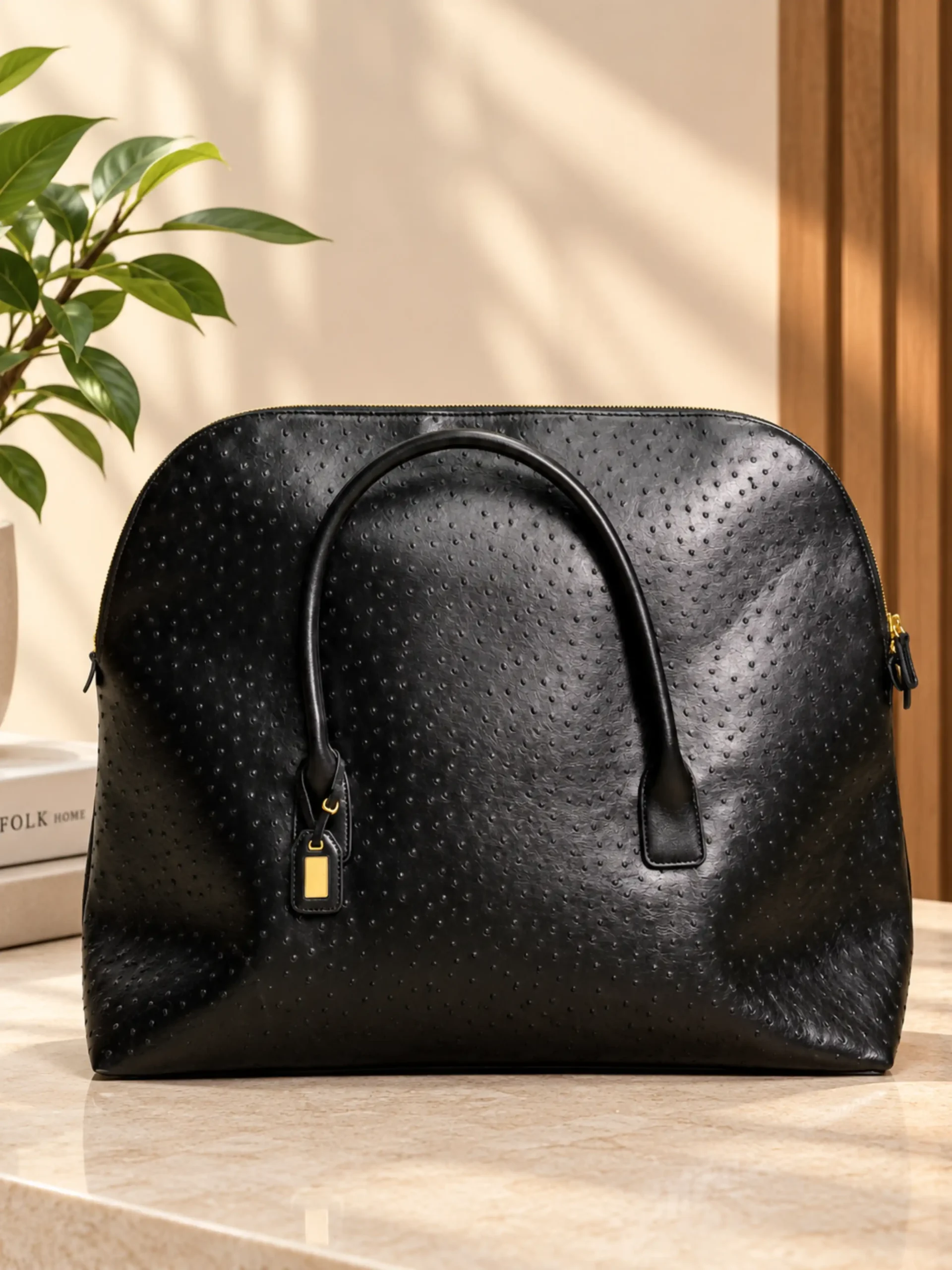 The Noir Weekender Ostrich Leather Bag - Black The Noir Weekender Ostrich Leather Bag - Black